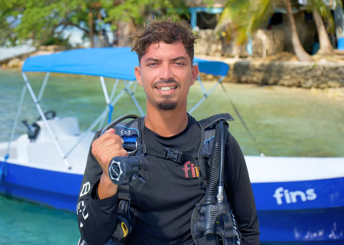 Luis Castillo on the FINS boat in southern Belize