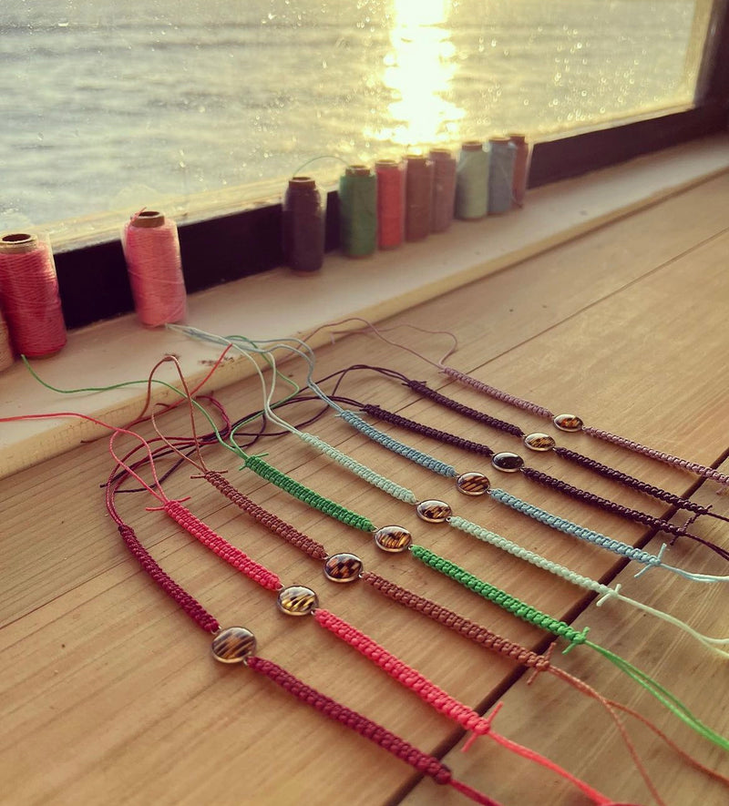 String bracelets handcrafted in Belize